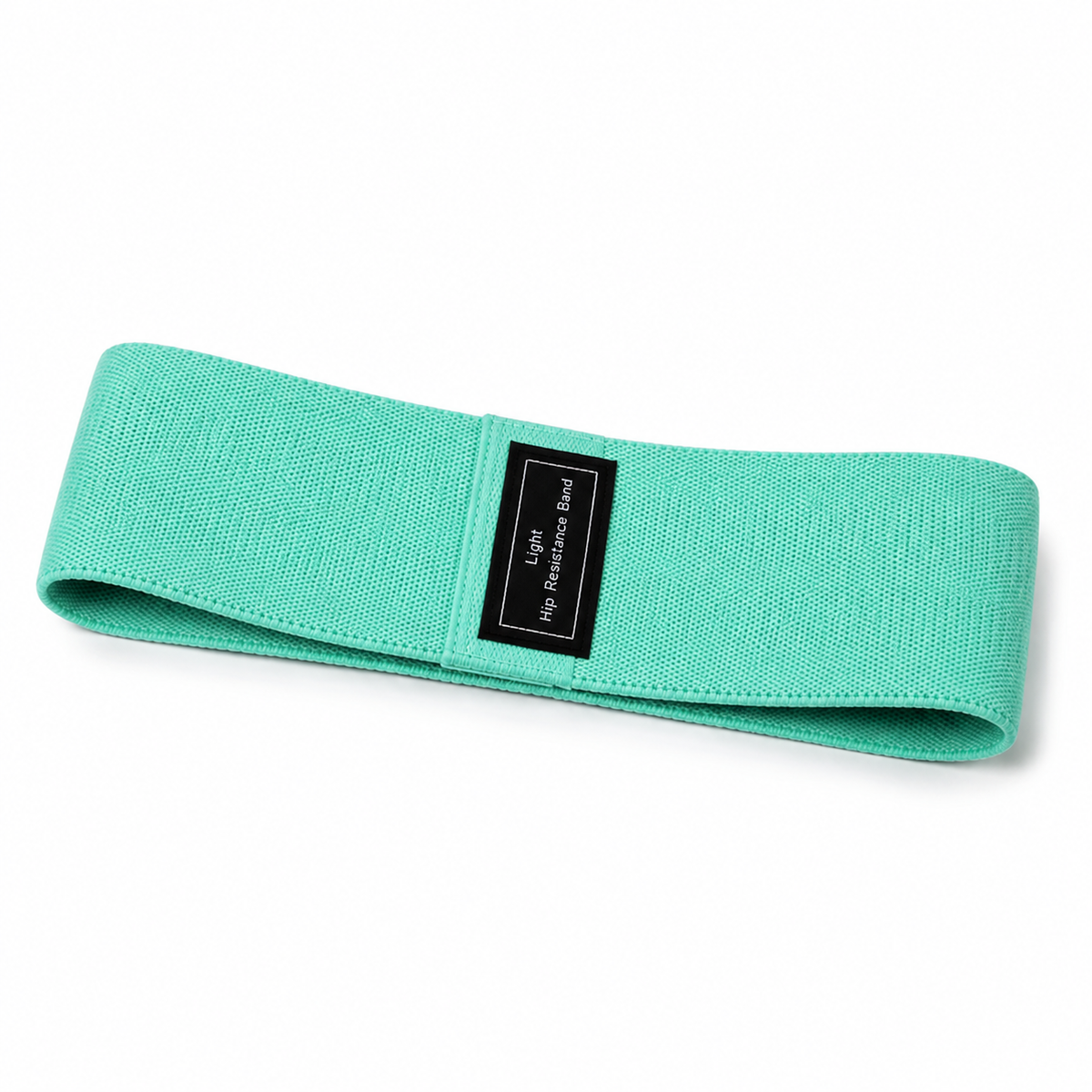 Bande de résistance Vela verte pour exercices de jambes et fessiers sur fond blanc